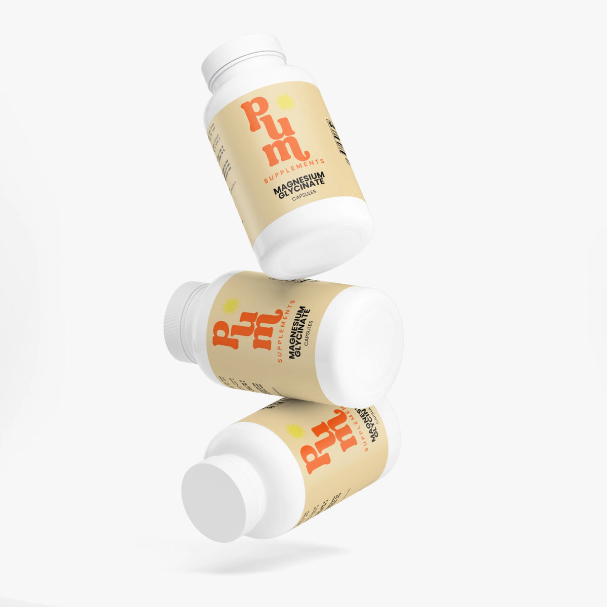 Three Plum Supplements Magnesium Glycinate bottles floating