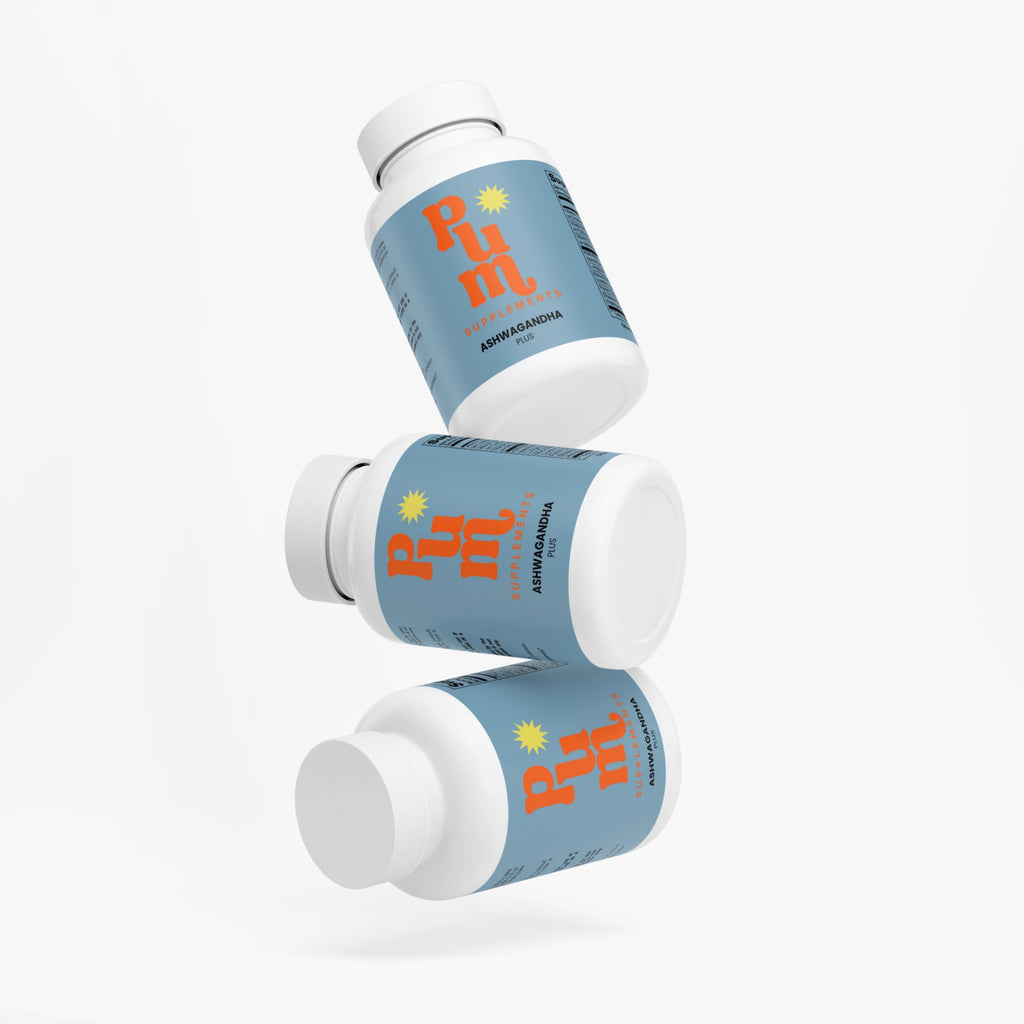 Three Ashwagandha Plus bottles floating in a stack